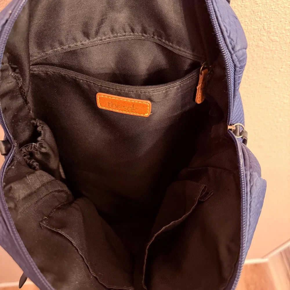 The Sak Navy Blue Textured Diamond Quilted Backpack Bag with Black Straps